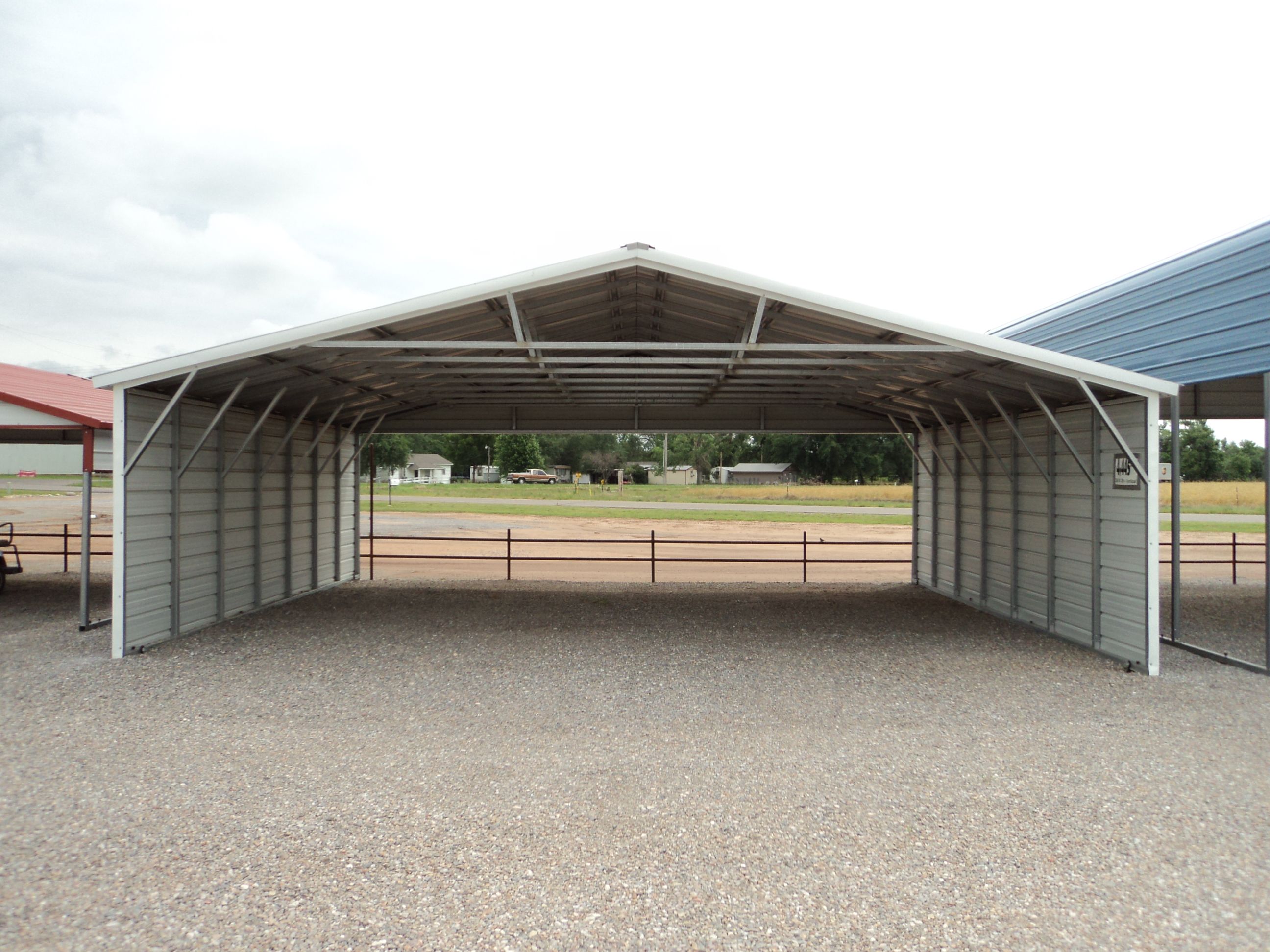 20x21x7 Regular Style Carport With: (2) Gable Ends Retails for: $1815. tax ...