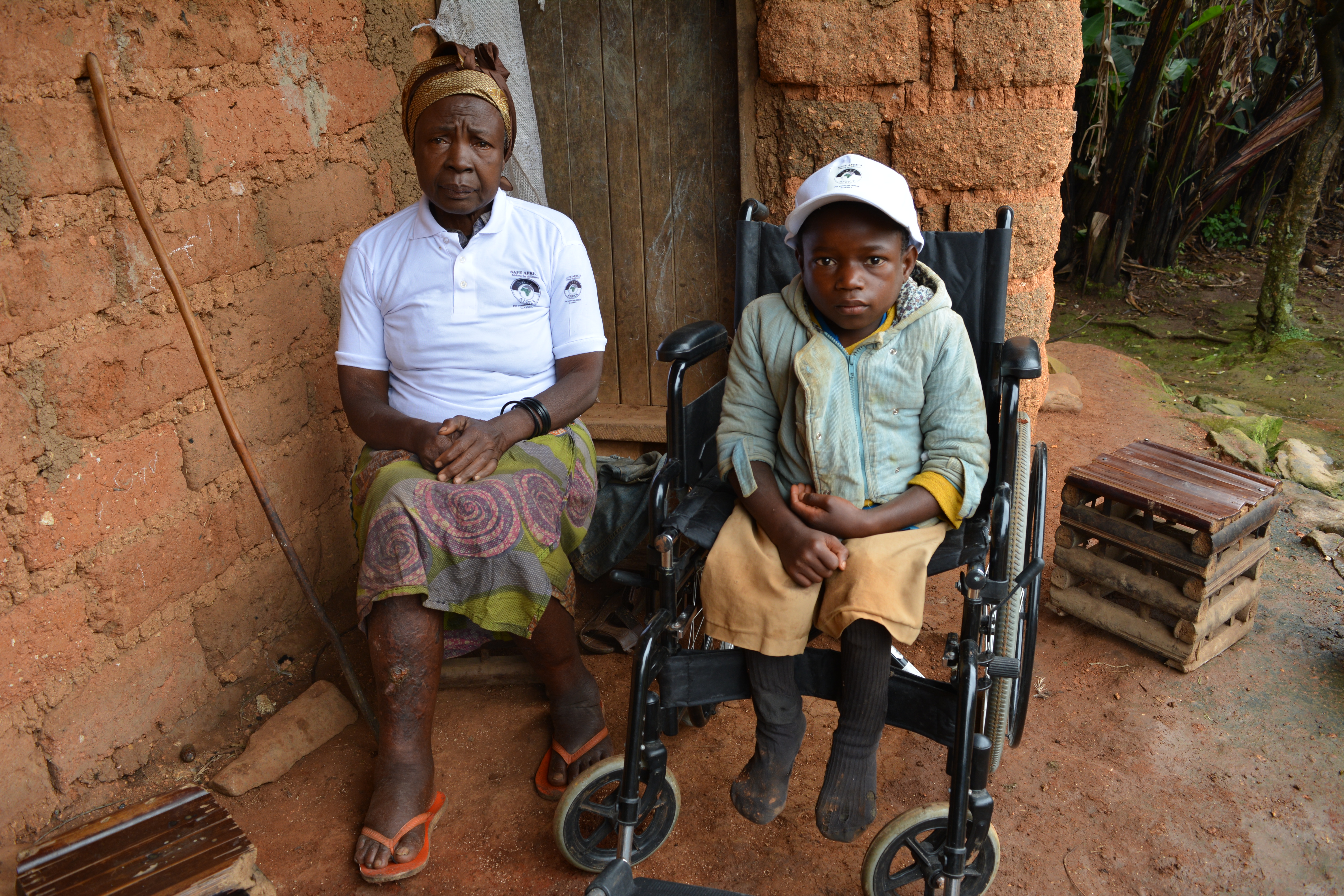 Elijah with his great grand mum and the new wheelchair